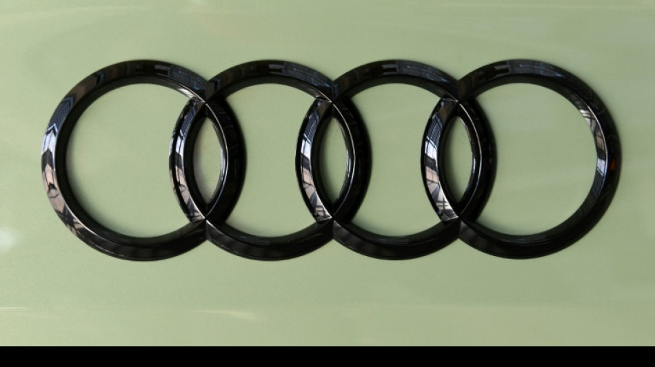  Carmaker Audi cuts outlook again on China, US woes 