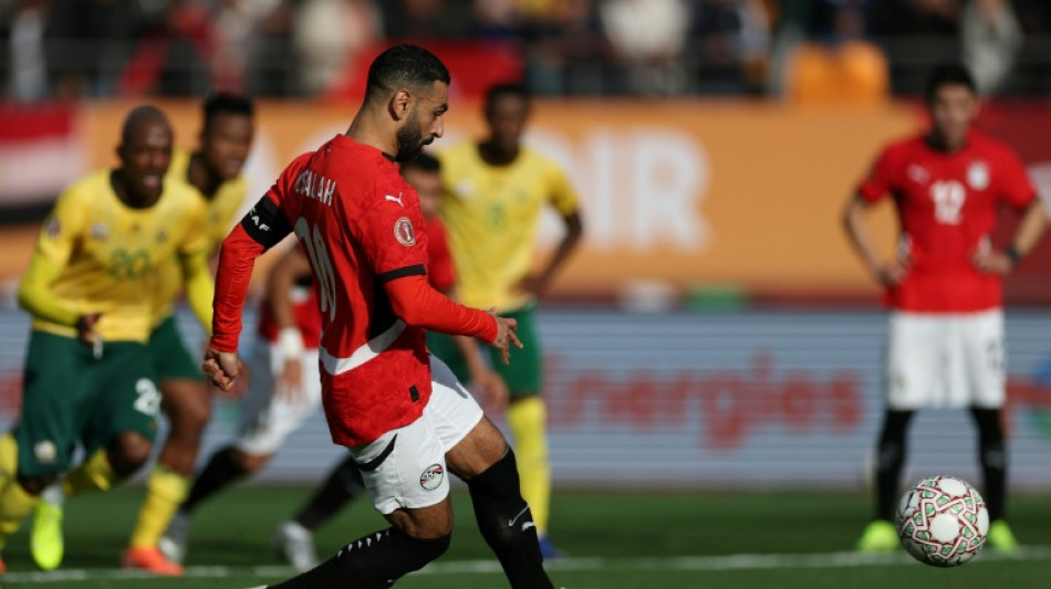 Salah helps 10-man Egypt beat South Africa and book last-16 place
