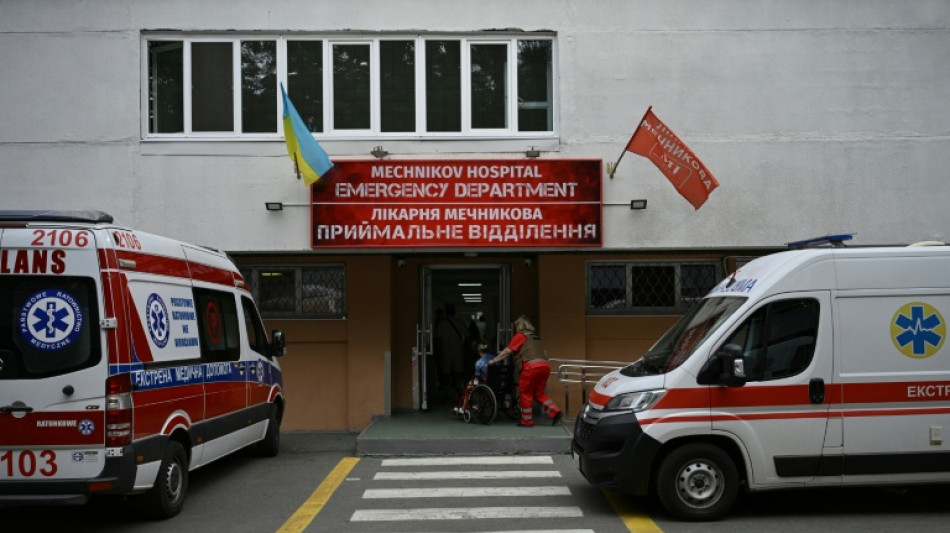  24 hours in a Ukrainian hospital, buckling under the toll of war 