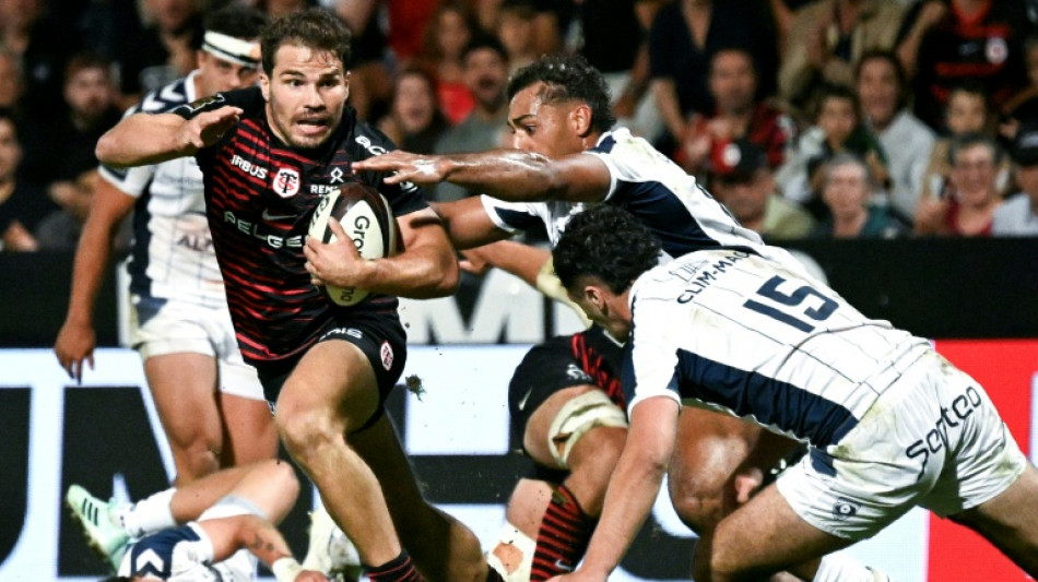  Dupont scores twice to send Toulouse top of Top 14 