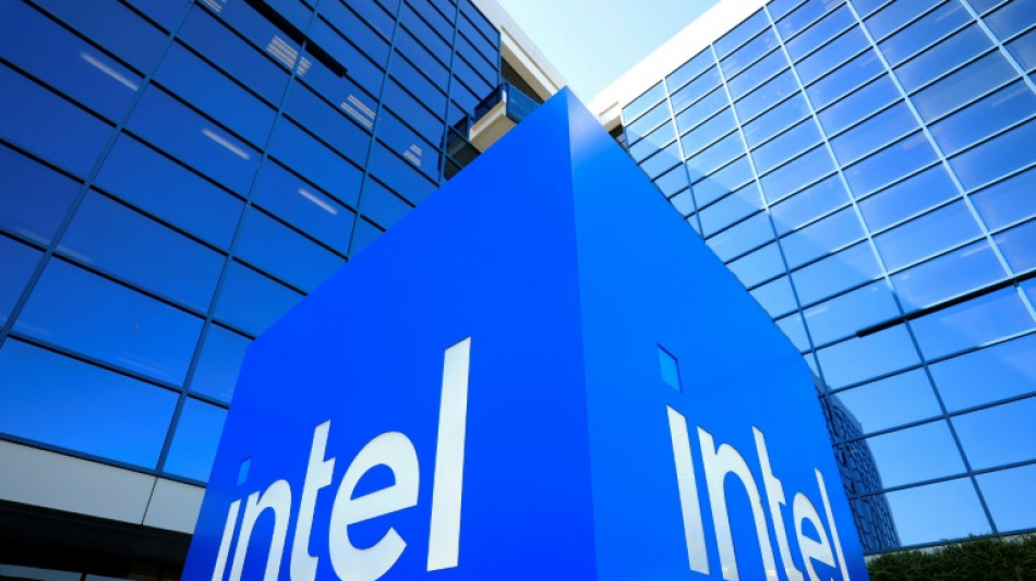 US chip maker Intel says revenue rose as it cut ranks