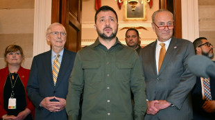Zelensky, in Washington, wins US air defense arms but faces aid battle