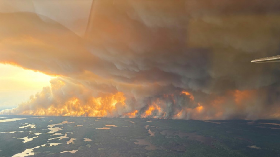 Canadian wildfire emergency spreads to second province
