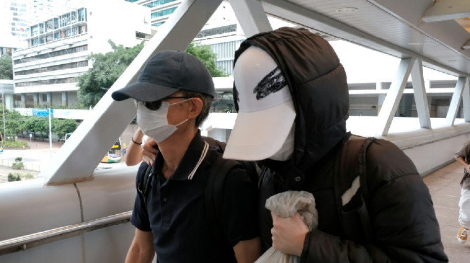  Hong Kong sentences father of wanted activist to 8 months in jail 
