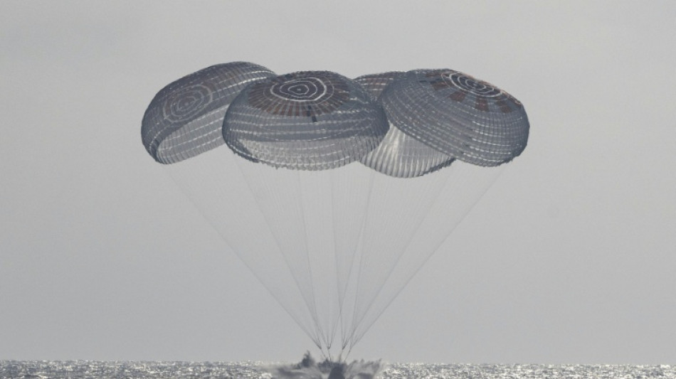 Crew splashes down after 8-month mission on International Space Station 