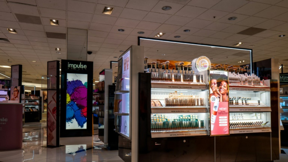 US stocks end at fresh records as markets shrug off tariff worries