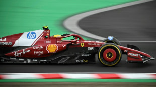 Hamilton says Ferrari still off the pace in Japan