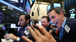 Wall Street conclut en hausse une s&eacute;ance h&eacute;sitante en attendant l'inflation