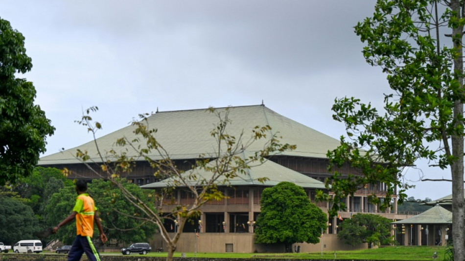 Sri Lanka's embattled president escapes censure motion