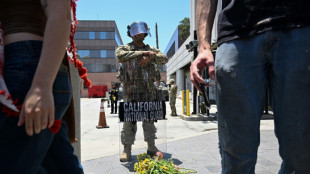 Nighttime curfew in LA as Trump vows to 'liberate' city
