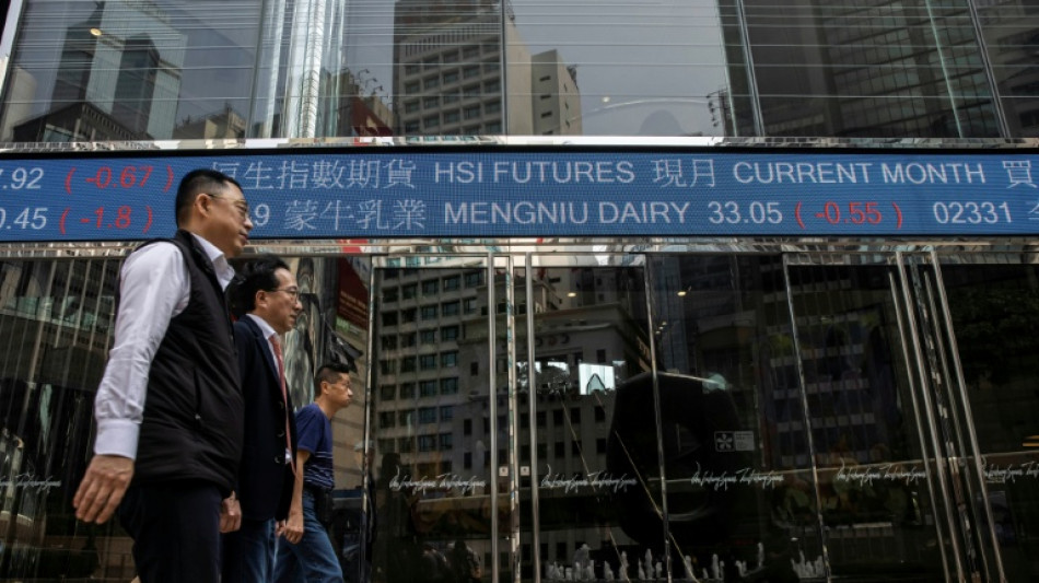 World stocks mostly slide, consolidating Fed-fuelled gains