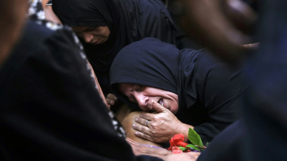 Gaza civil defence says Israeli fire kills 32 near two aid centres