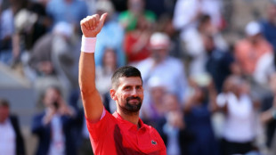 Djokovic into French Open quarters as No.361 Boisson springs upset