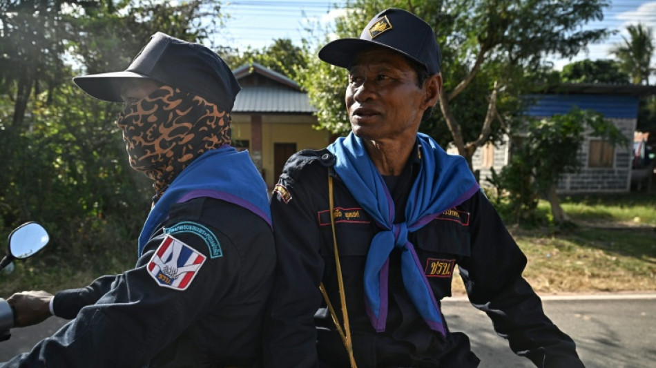  Volunteers patrol Thai villages as artillery rains at Cambodia border 