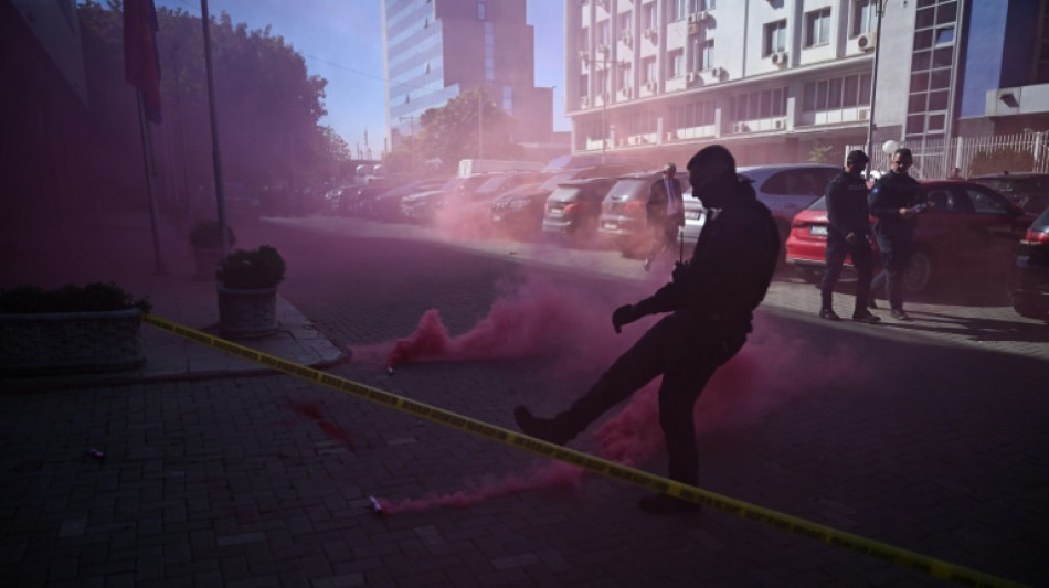  Clashes erupt outside Kosovo parliament over war crimes court
 