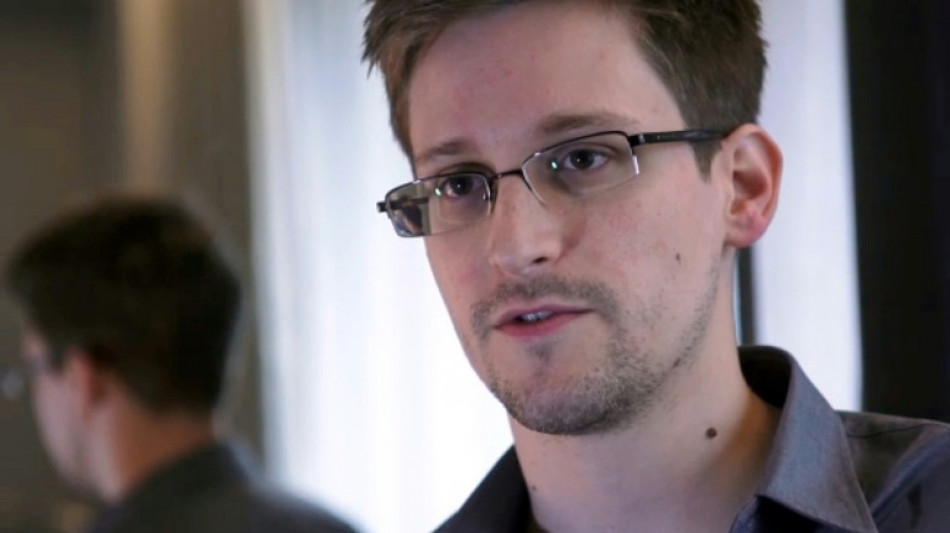 Putin grants Edward Snowden Russian citizenship