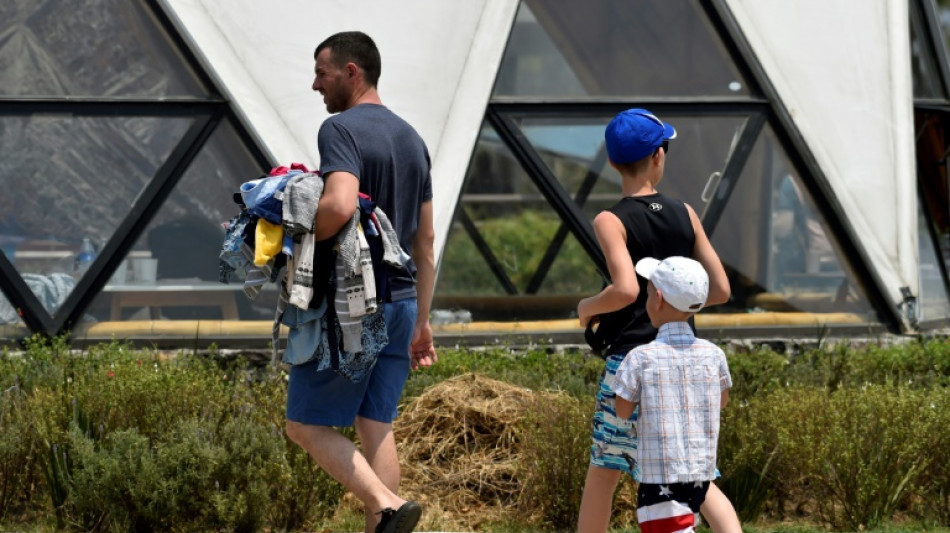 Un campamento en Ciudad de M&eacute;xico, &uacute;ltima escala de ucranianos hacia EEUU