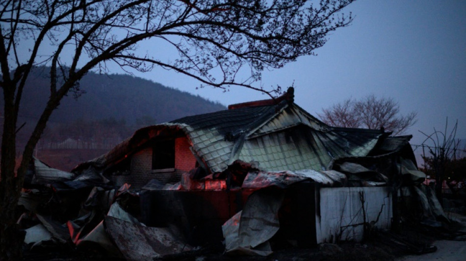 Rain offers respite to South Korea firefighters as death toll rises