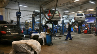 Ukraine garage turns beat-up cars into battlefield assets