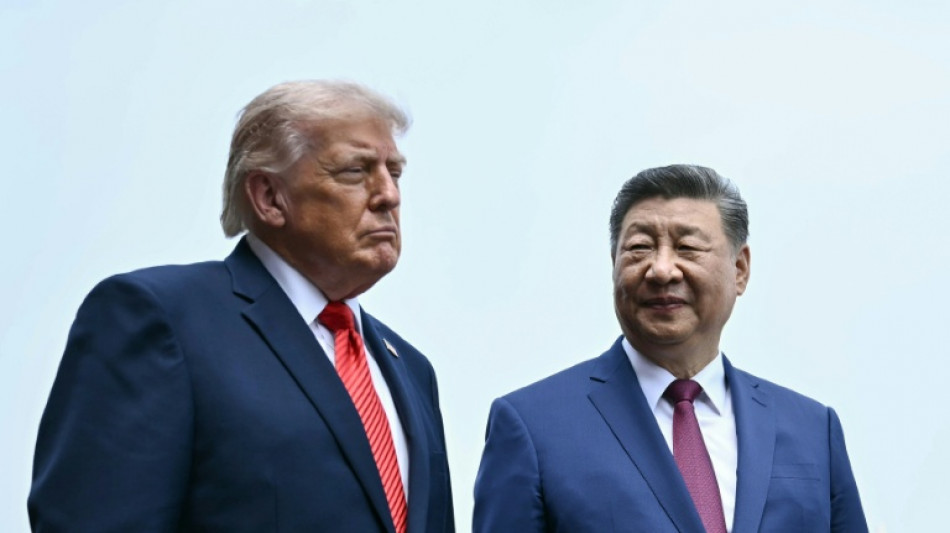  Subdued Trump left waiting for 'big hug' from Xi 
