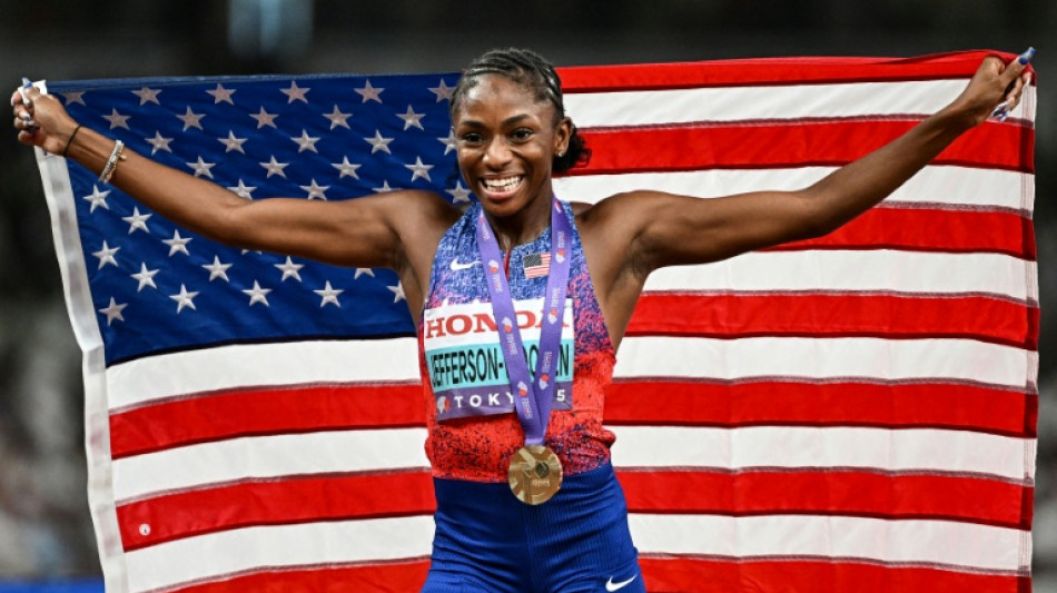 Jefferson-Wooden embraces the moment and basks in 100m world title