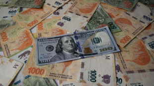 Argentina devalues peso after shock primary election result