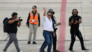 Honduran ex-president returns home after Trump pardon