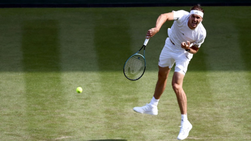  Zverev wins in four sets to reach Wimbledon round two 
