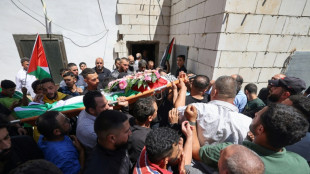 Mourners bury Palestinian killed by Israeli settlers