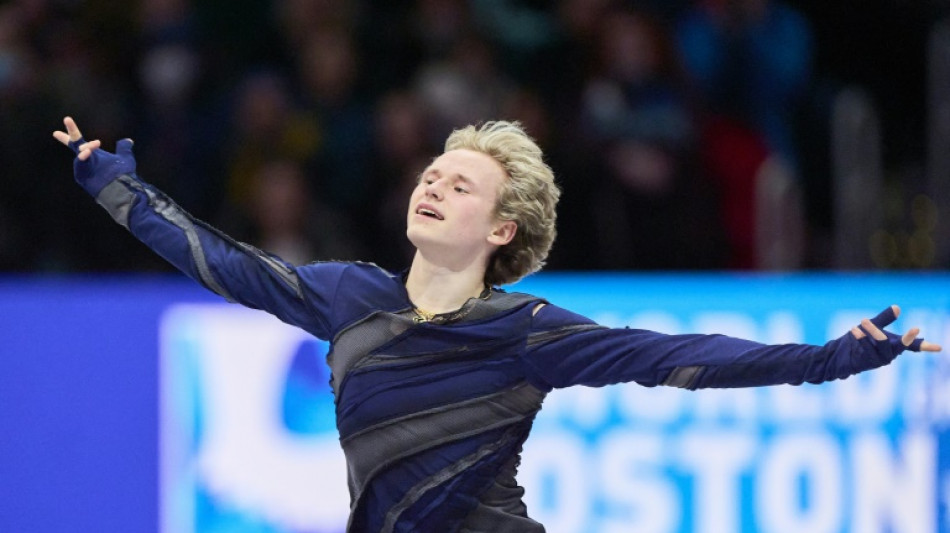 Standing ovation as defending champ Malinin grabs world figure skating lead