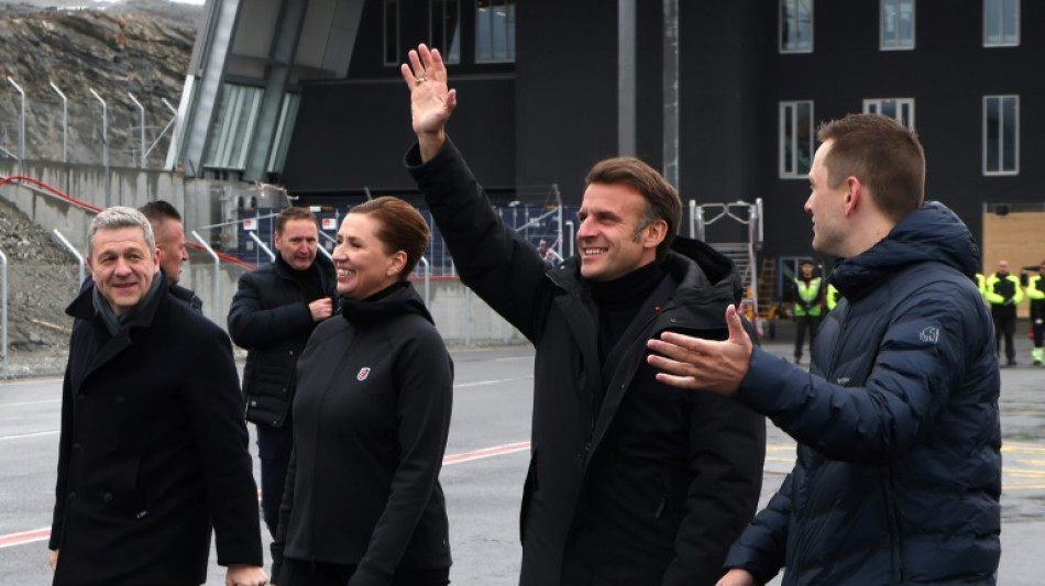 Macron, on Greenland visit, berates Trump for threats against the territory