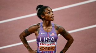 Defending champion Richardson struggles into 100m world final