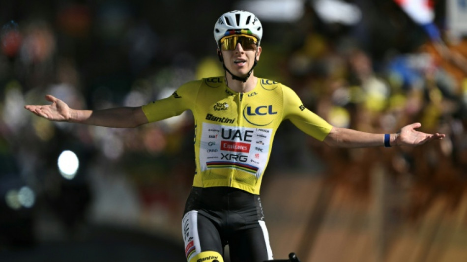  Pogacar extends Tour de France lead with  
Alpe d'Huez win 