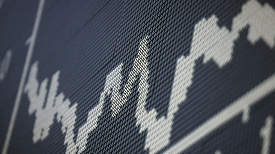  Stocks fluctuate as traders assess AI fallout, tariffs  