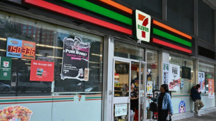 Asian stocks extend Wall St gains, 7-Eleven owner plunges