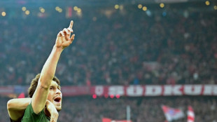 Rodgers vows to stay with Celtic after fourth successive Scottish title