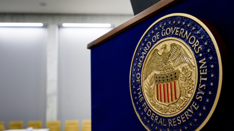 Stocks, dollar calm before expected US rate cut