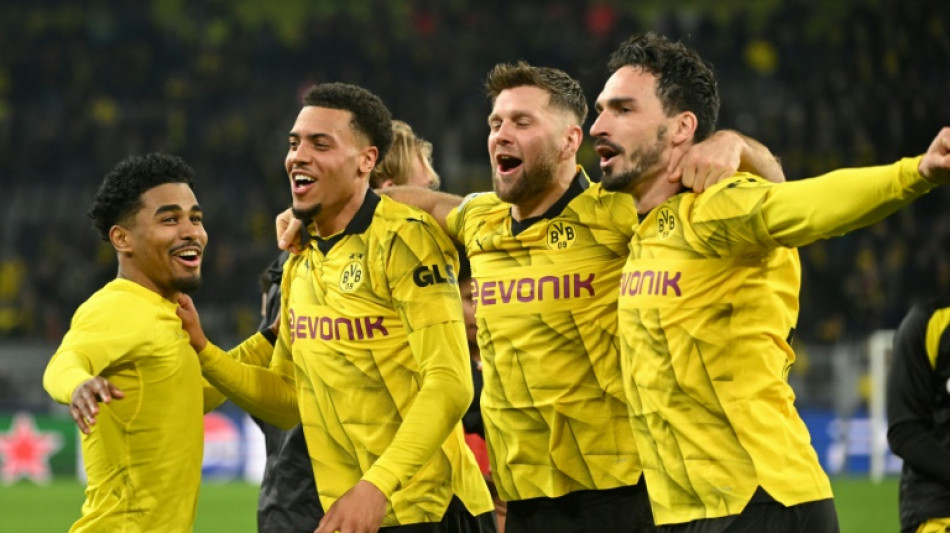 Borussia Dortmund vence PSV (2-0) e vai &agrave;s quartas da Champions