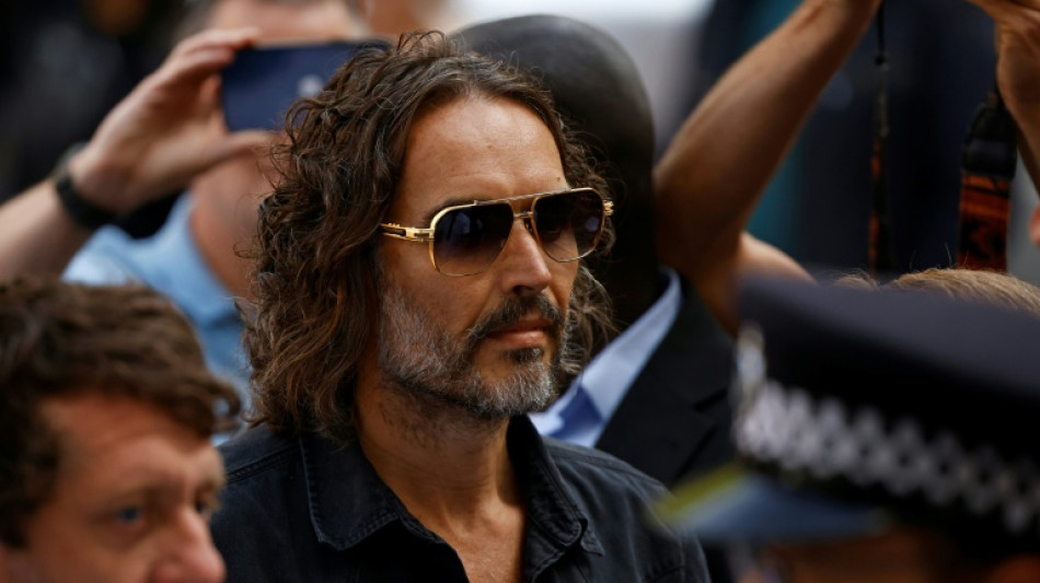 UK comedian Russell Brand arrives at court to face rape charges