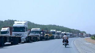 Iranians buying supplies in Iraq tell of fear, shortages back home 
