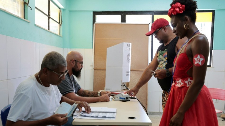  Brazil braces for result of knife-edge election after voting chaos 
