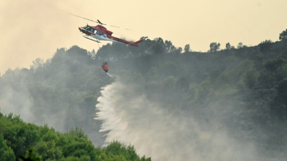  'Monster' wildfires force 350,000 from homes in France, Spain 