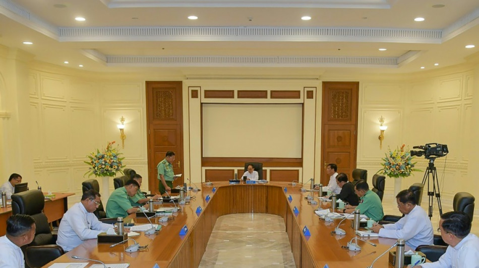 Myanmar junta cuts six years from Suu Kyi's 33-year jail term