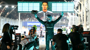 Russell wins Singapore GP, McLaren seal constructors' title