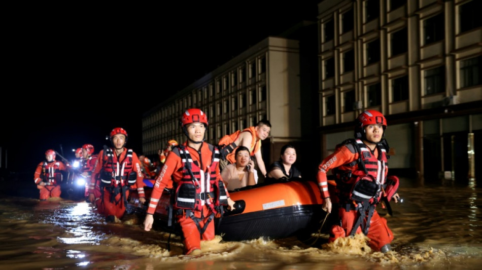  Rescuers search for survivors of China storms as super typhoon nears 