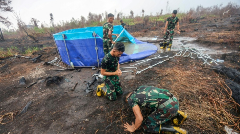  Rains bring relief to Indonesian city weary of fire haze 