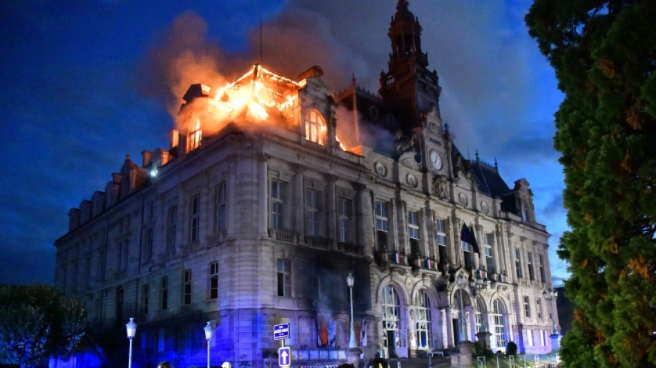  Town hall in Limoges 'largely lost' to blaze set during French protests 