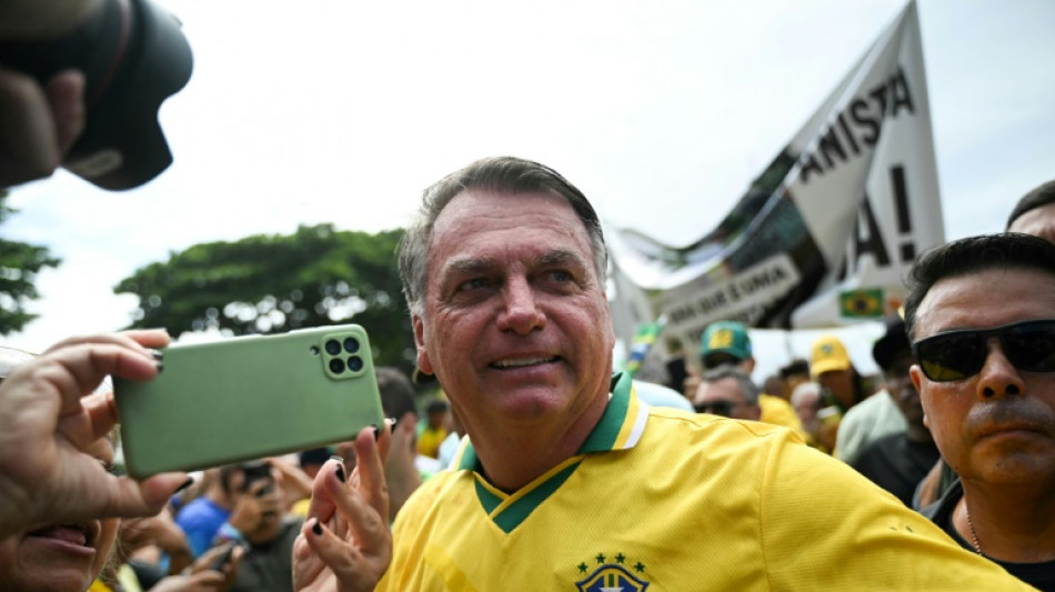 Ailing Bolsonaro says he will 'probably' need surgery 