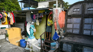 Impoverished Filipinos forge a life among the tombstones