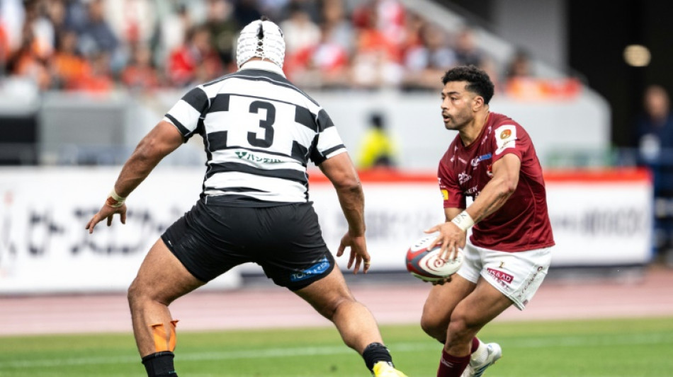 Mo'unga shrugs off broken hand to win Japanese title